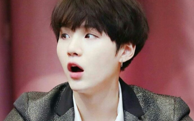 Así reaccionó de Suga de BTS al encontrarse con un ARMY BOY