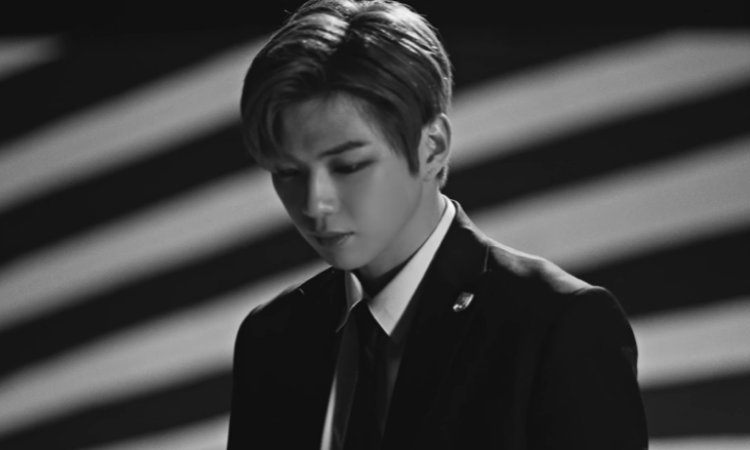 Kang Daniel huye del tiempo en el clip conceptual 'Silent Black' para 'Outerspace'